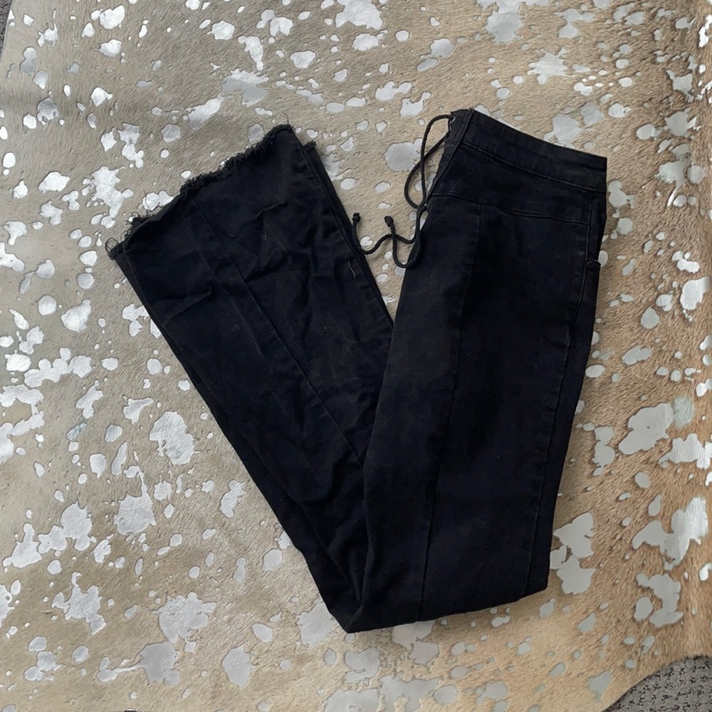High waisted flare black jeans with tie detail